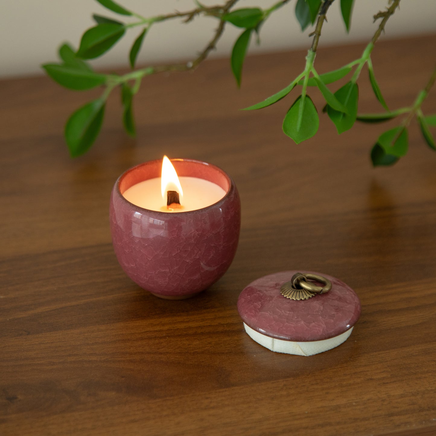 Candle in ceramic tea container with craquelé – rose red
