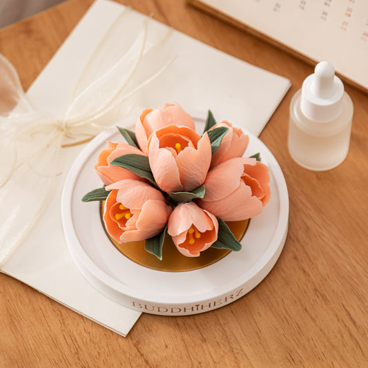 Rosa Tulpen-Porzellanblume mit Duftöl