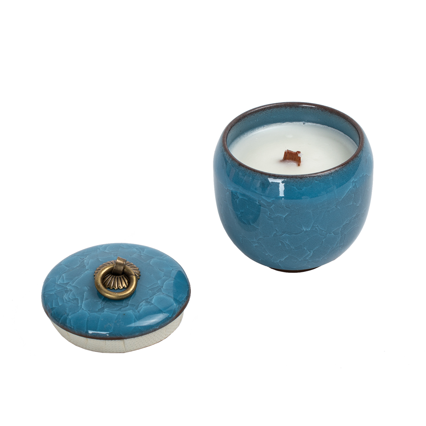Candle in ceramic tea container with craquelé – sky blue