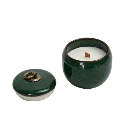 Candle in ceramic tea container with craquelé – peacock green 
